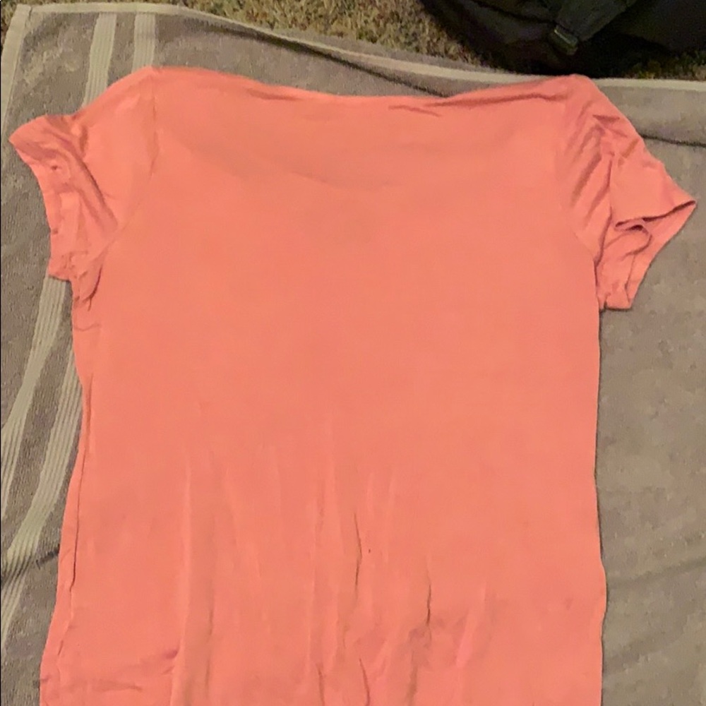 a pink shirt